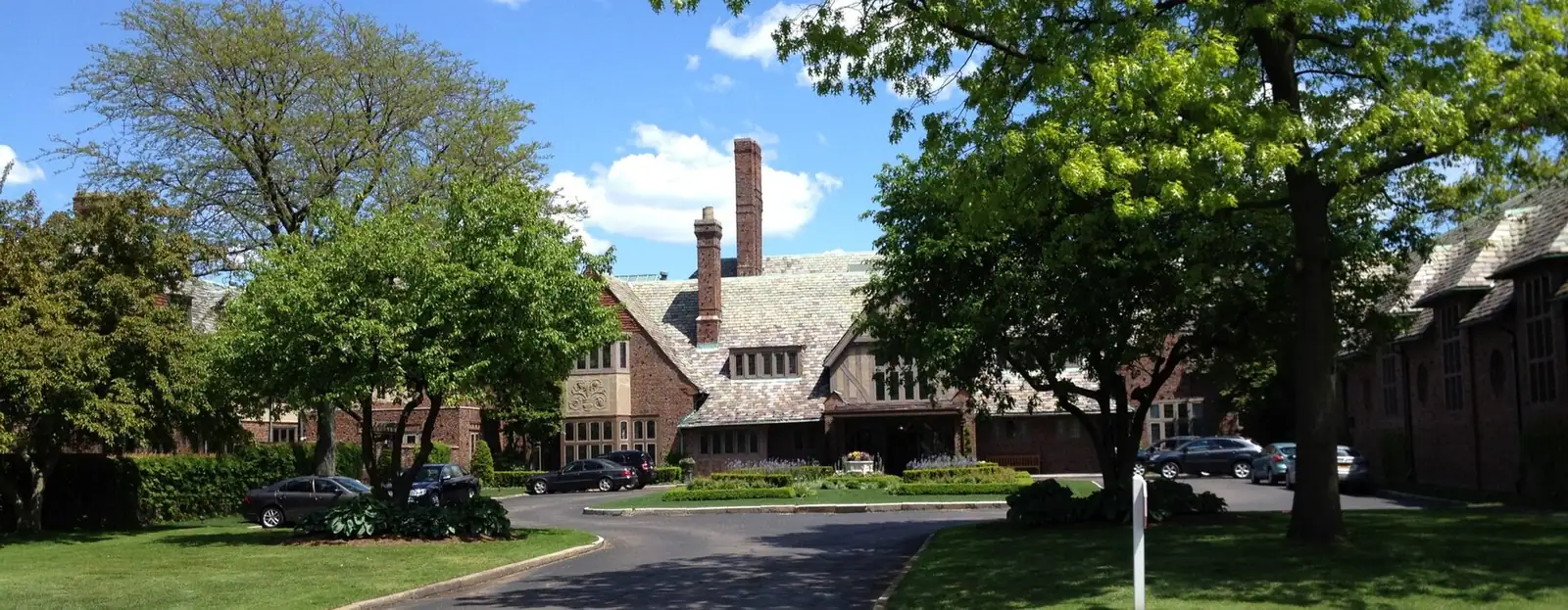 A Tudor-style home with mature landscaping