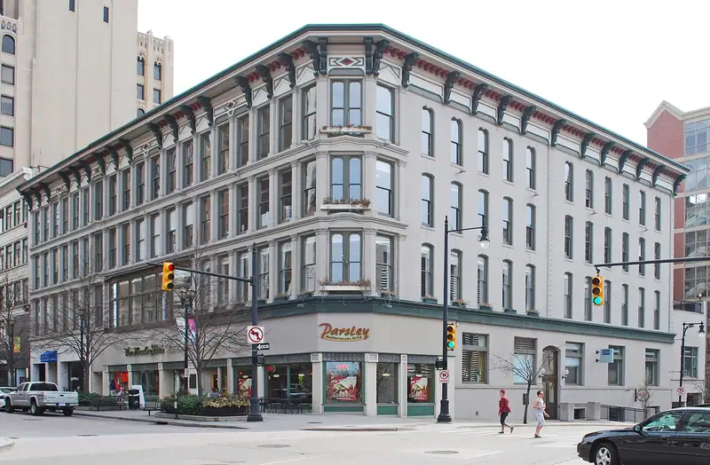 An ornate historic commercial block on a downtown corner