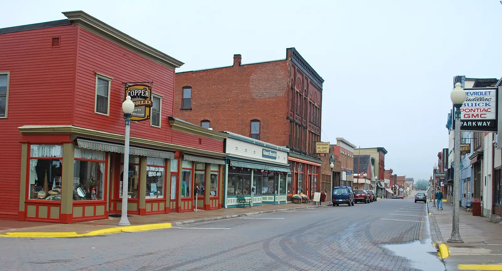 Historic sandstone and brick buildings on a downtown street