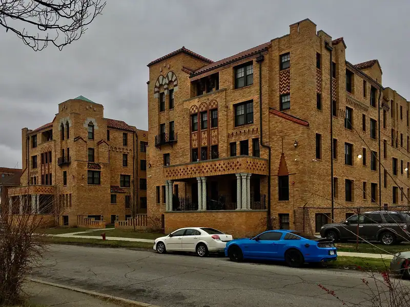 A historic apartment building on a corner