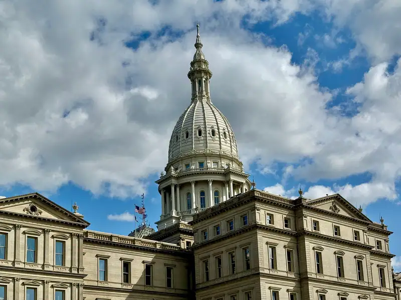 The capitol dome rising above downtown