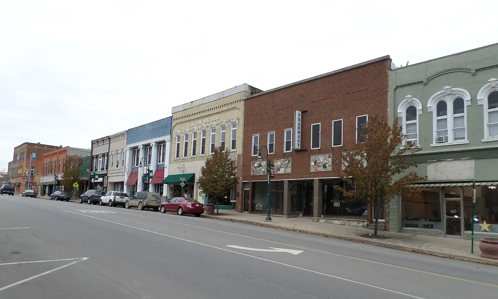A row of historic storefronts on a downtown street