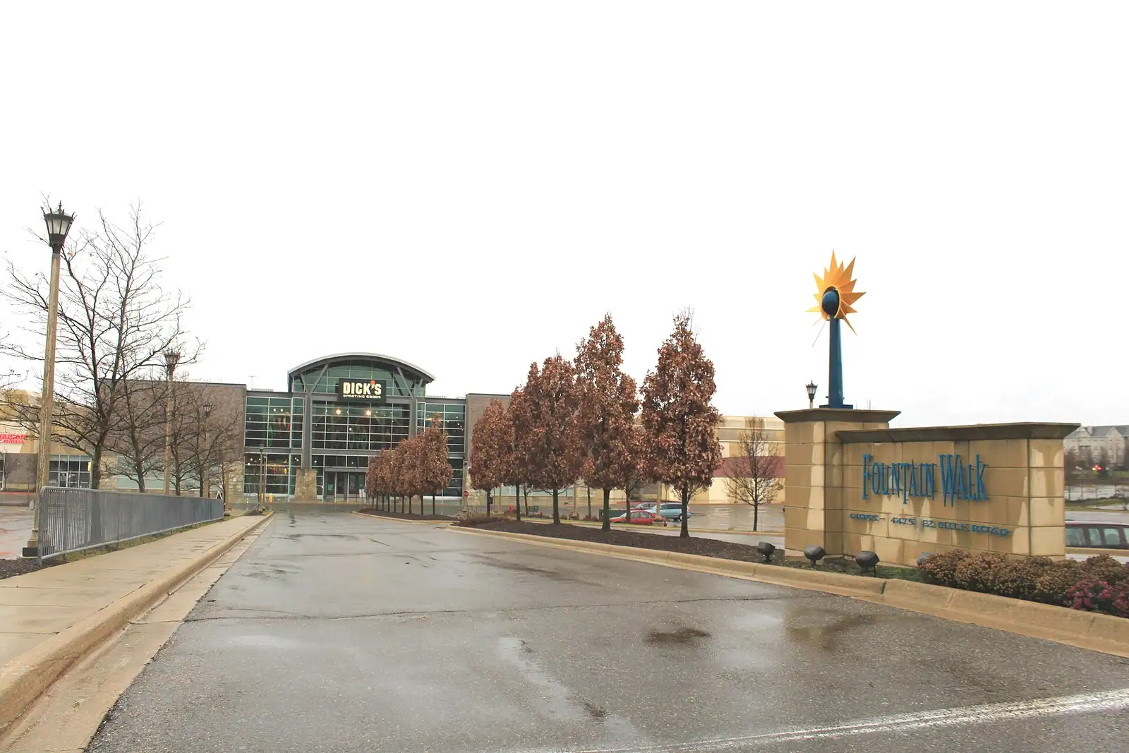 A landscaped plaza entrance with trees