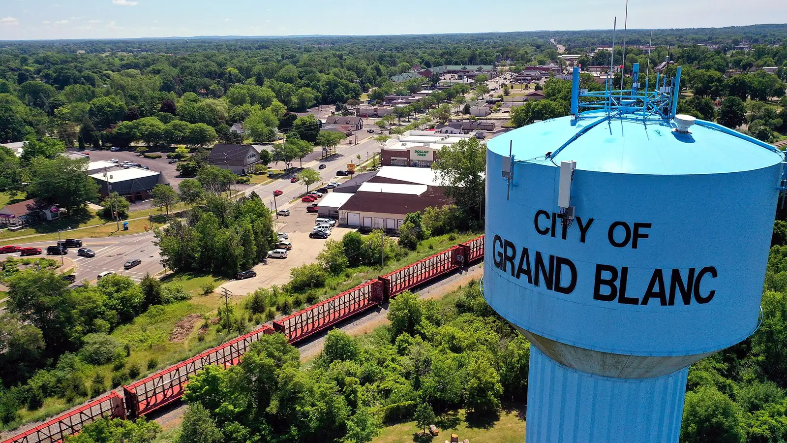 Aerial view of Grand Blanc with its water tower and trees