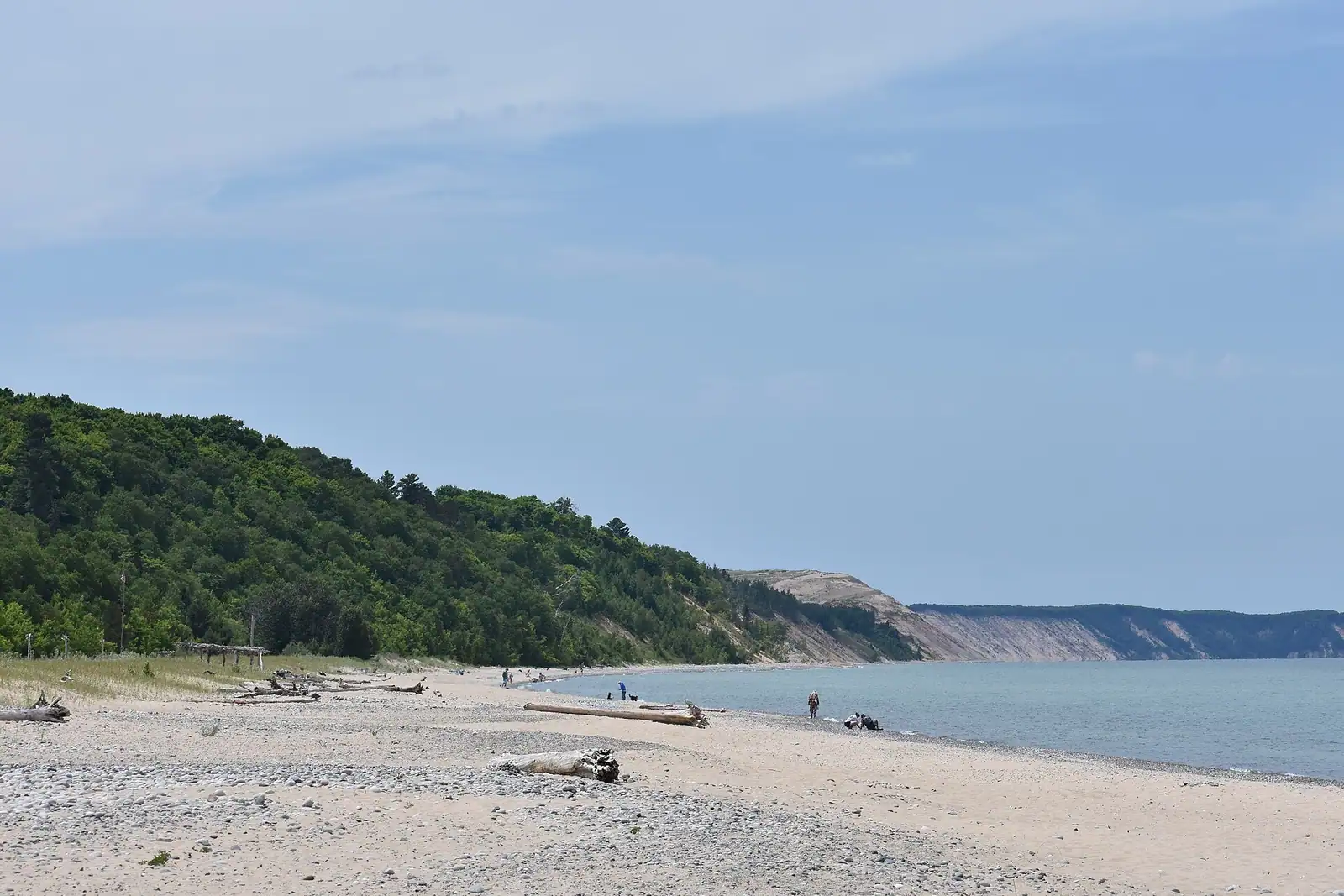 A pebble beach on Lake Superior under blue sky