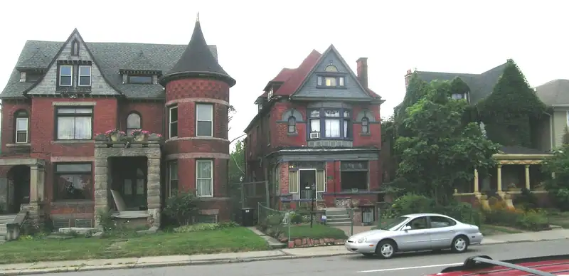 Historic houses on a tree-lined avenue